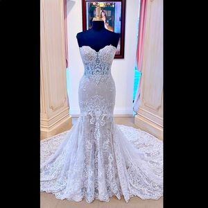 Never worn never altered wedding gown